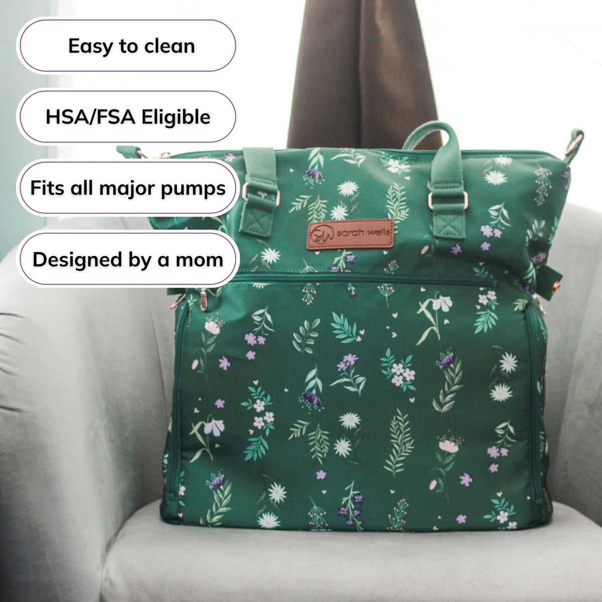 Woman carrying the Sarah Wells Lizzy pump tote in olive, with badges for easy to clean, HSA/FSA eligible, fits all major pumps, and designed by a mom