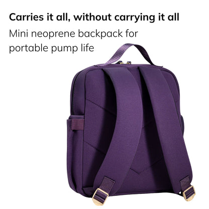 Sarah Wells Fifi mini pump backpack in Purple, three-quarter view, with the headline "Carries it all, without carrying it all" and subhead "Mini neoprene backpack for portable pump life".
