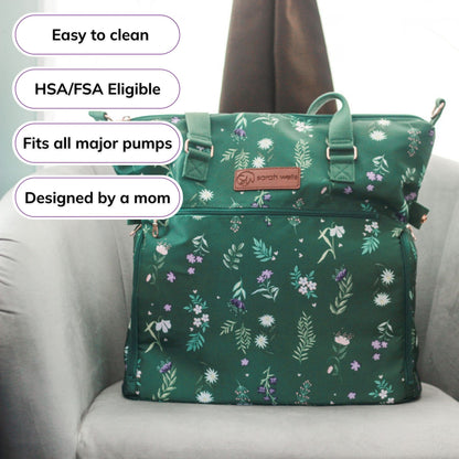 Woman carrying the Sarah Wells Lizzy pump tote in olive, with badges for easy to clean, HSA/FSA eligible, fits all major pumps, and designed by a mom